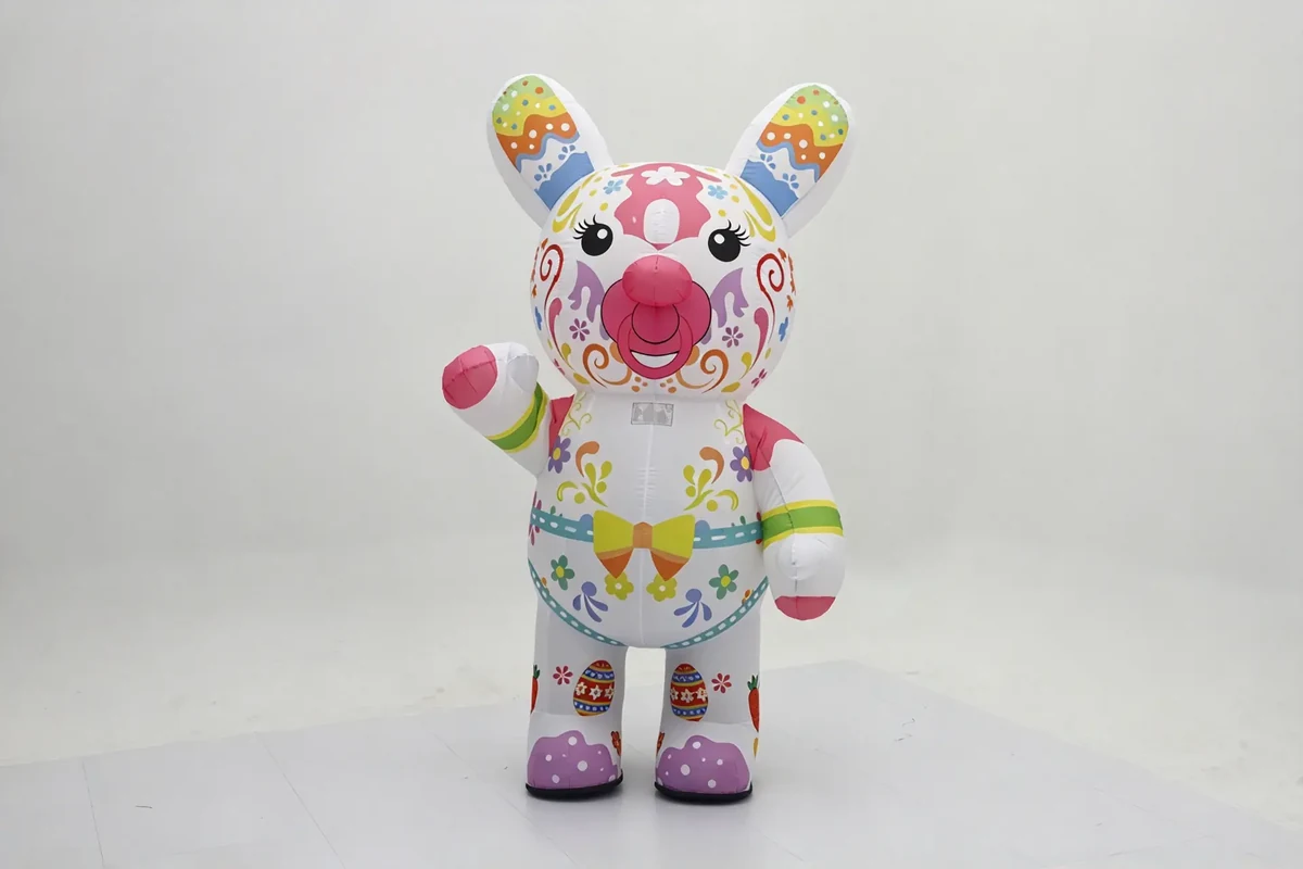Waving Folk Art Rabbit Mascot — inflatable mascot costume, factory photo